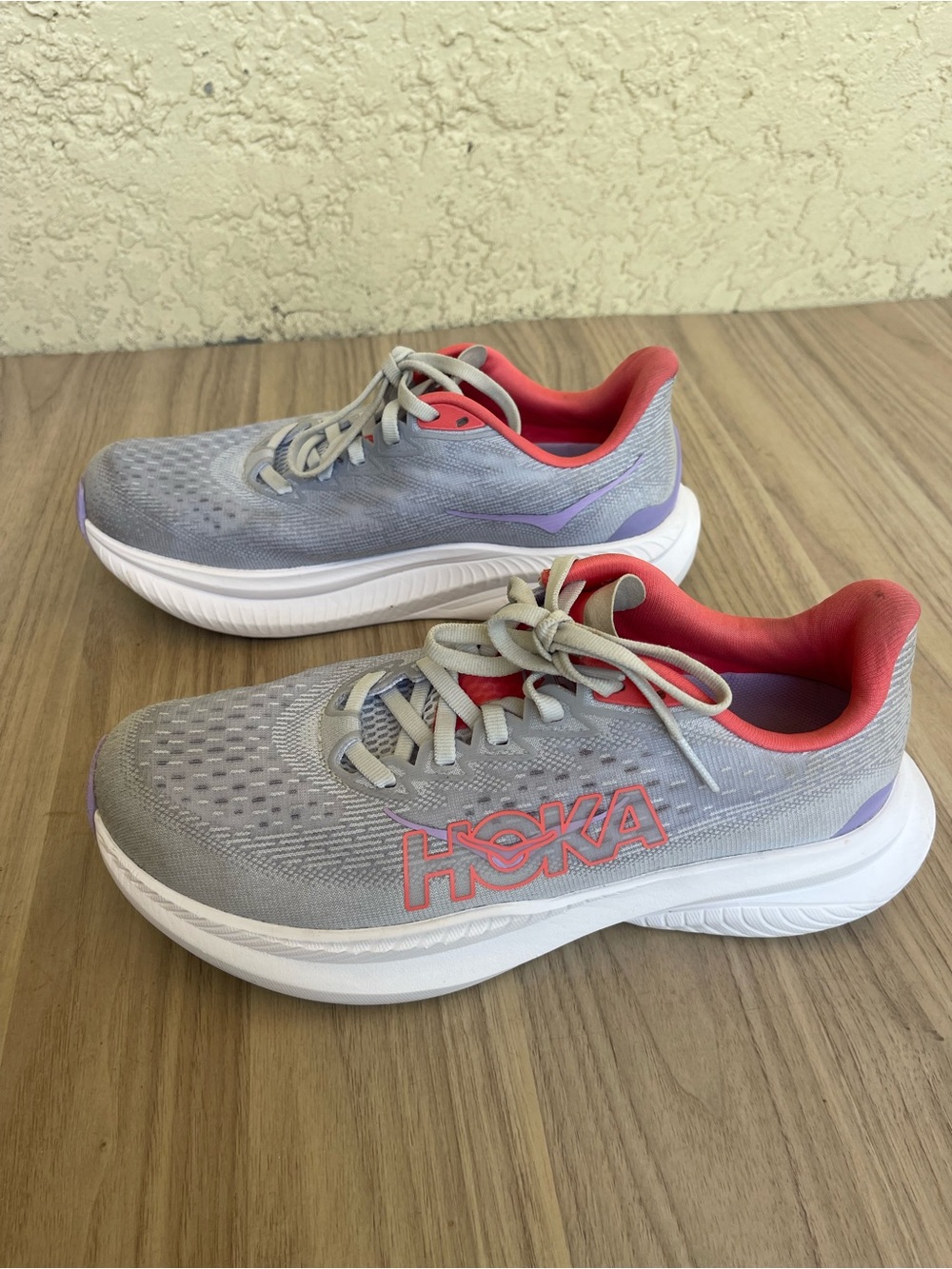 Hoka Women's Light Gray Running Shoes with Coral & Lavender Accents